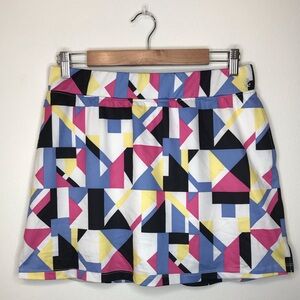 IZOD Women’s Skort golf skirt size medium, EUC, multicolored geometric pattern